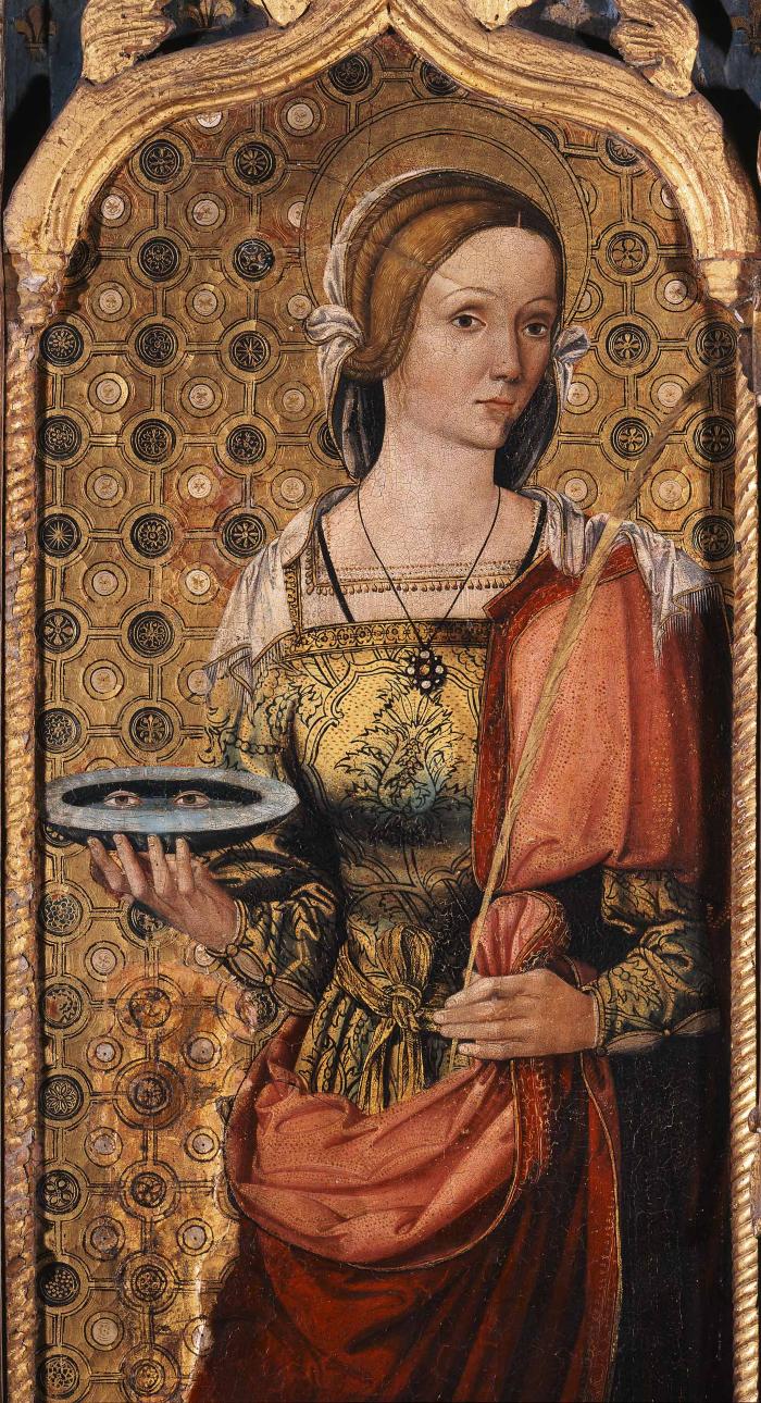 Sainte-Lucie. Détail retable du Précurseur (1524), église paroissiale Saint-Jean-Baptiste, Villars-sur-Var. Cliché M. Graniou.